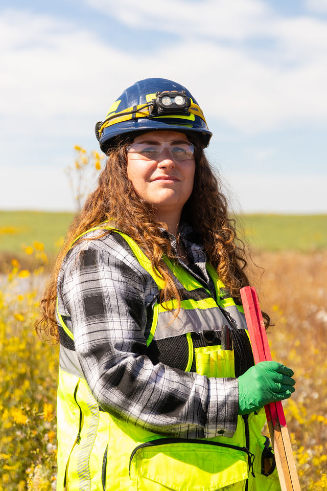 Jasmine Redmond in field safety gear on a project site